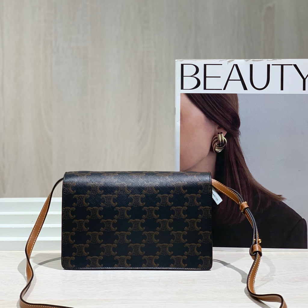 Celine TRIOMPHE canvas wallet with signature print and sheepskin trim 8 x 5 x 2 inches (20 x 12 x 6 centimeters) 10D852CG9.04LU