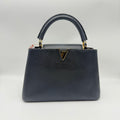 Louis Vuitton CAPUCINES medium-sized handbag 20 x 11 x 31.05 M24727
