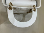 Dior Dimensions: 17 x 15 x 7 cm (length x height x width); strap length: 120 cm; length from the top of the strap to the top of the bag: 59 cm. M0505ONGE_M030