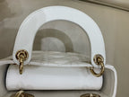 Dior Dimensions: 17 x 15 x 7 cm (length x height x width); strap length: 120 cm; length from the top of the strap to the top of the bag: 59 cm. M0505ONGE_M030